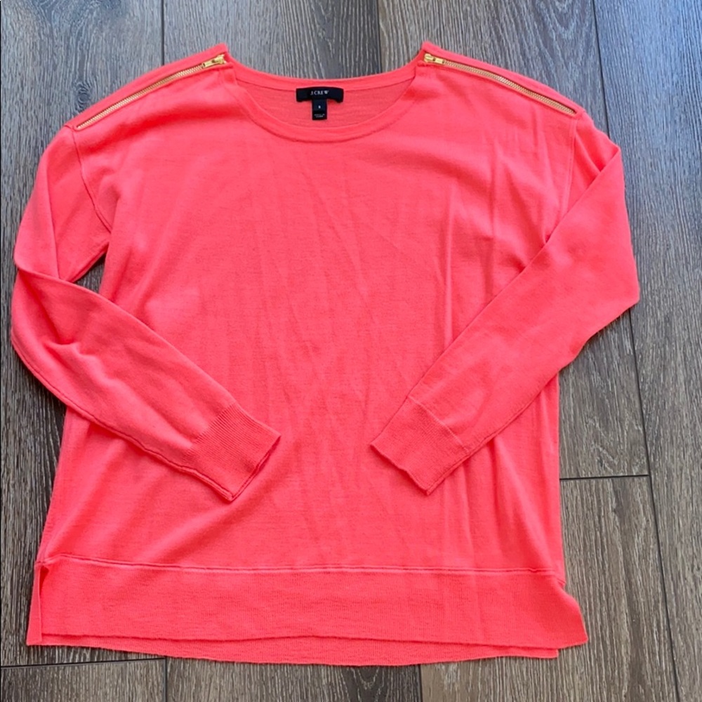 J Crew coral sweater with gold zipper detail